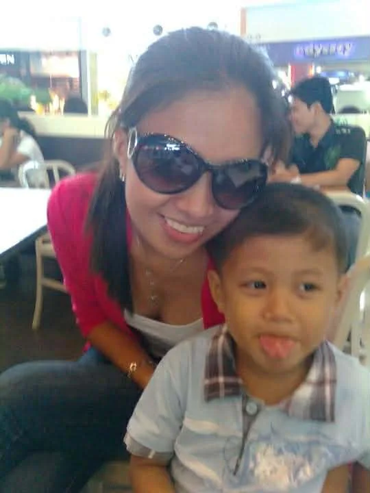 A childhood photograph with his mother